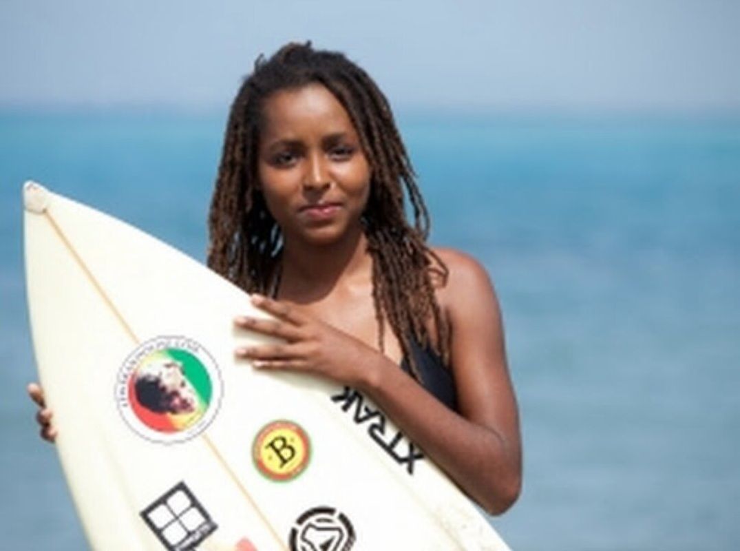 Imani Wilmot teaches girls to surf